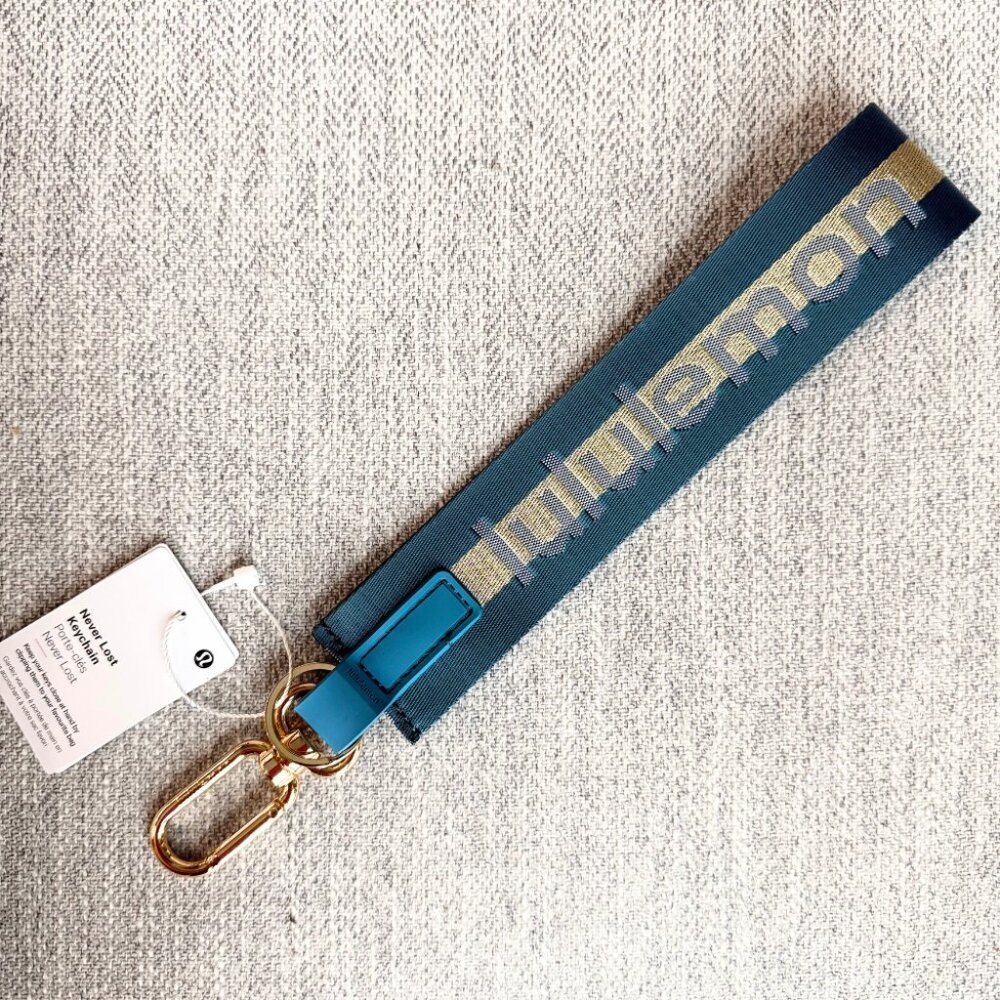 NEW Lululemon Never lost Keychain Wordmark Warp Teal Gold Blue